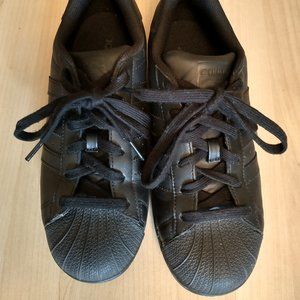 black Adidas Superstars